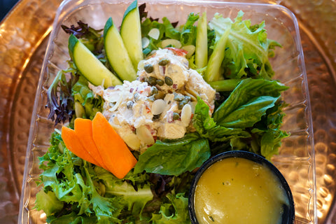 Tuscan Chicken Salad over Leafy Greens