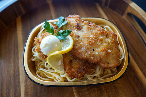 Pork Tenderloin Schnitzel w/Herb Butter over Pasta