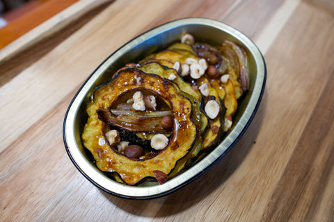 Acorn Squash with Maple Cider Reduction and Hazlenuts